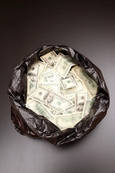 Rubbish bag with dollars — Stock Photo, Image